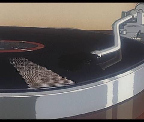 A close-up of a spinning retro record player, perfect for a looping background for Twitch or a seamless animated wallpaper to set a nostalgic mood.